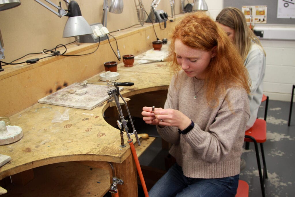 Gwen in the silversmithing studio