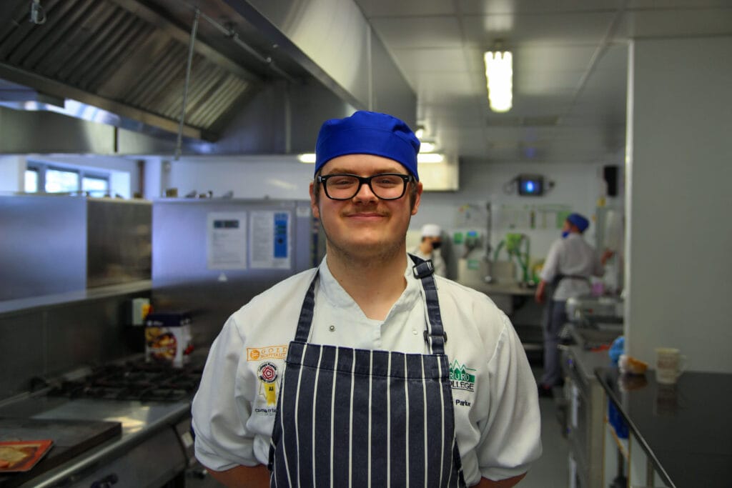 Joe in a College kitchen