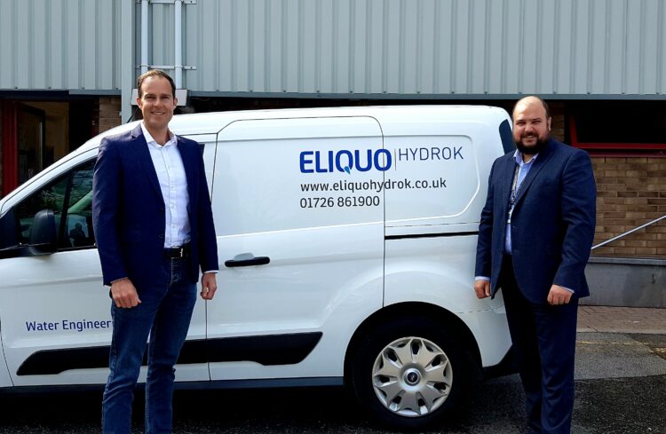 Peter Wroe and Tom Moran stood with an Eliquo Hydrok van