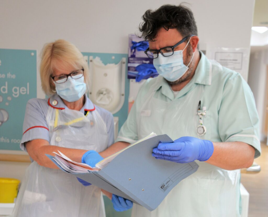 Clare and Niall from RCHT working at the hospital