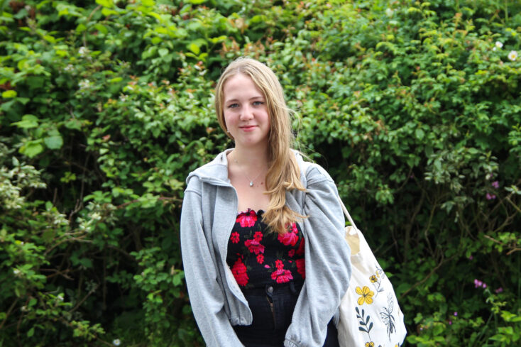 Alice stood in front of greenery. She studied A Level Psychology, Biology and English Language.