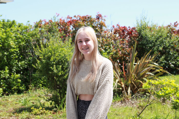 Aimee stood outside at the College