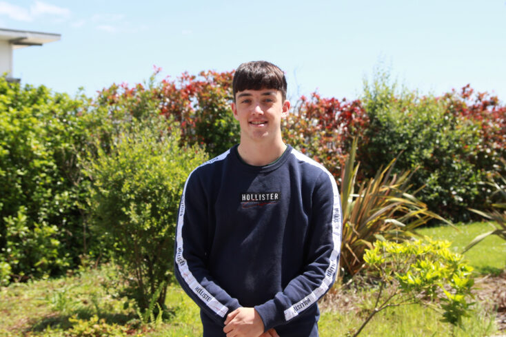 Matt stood outside at the College