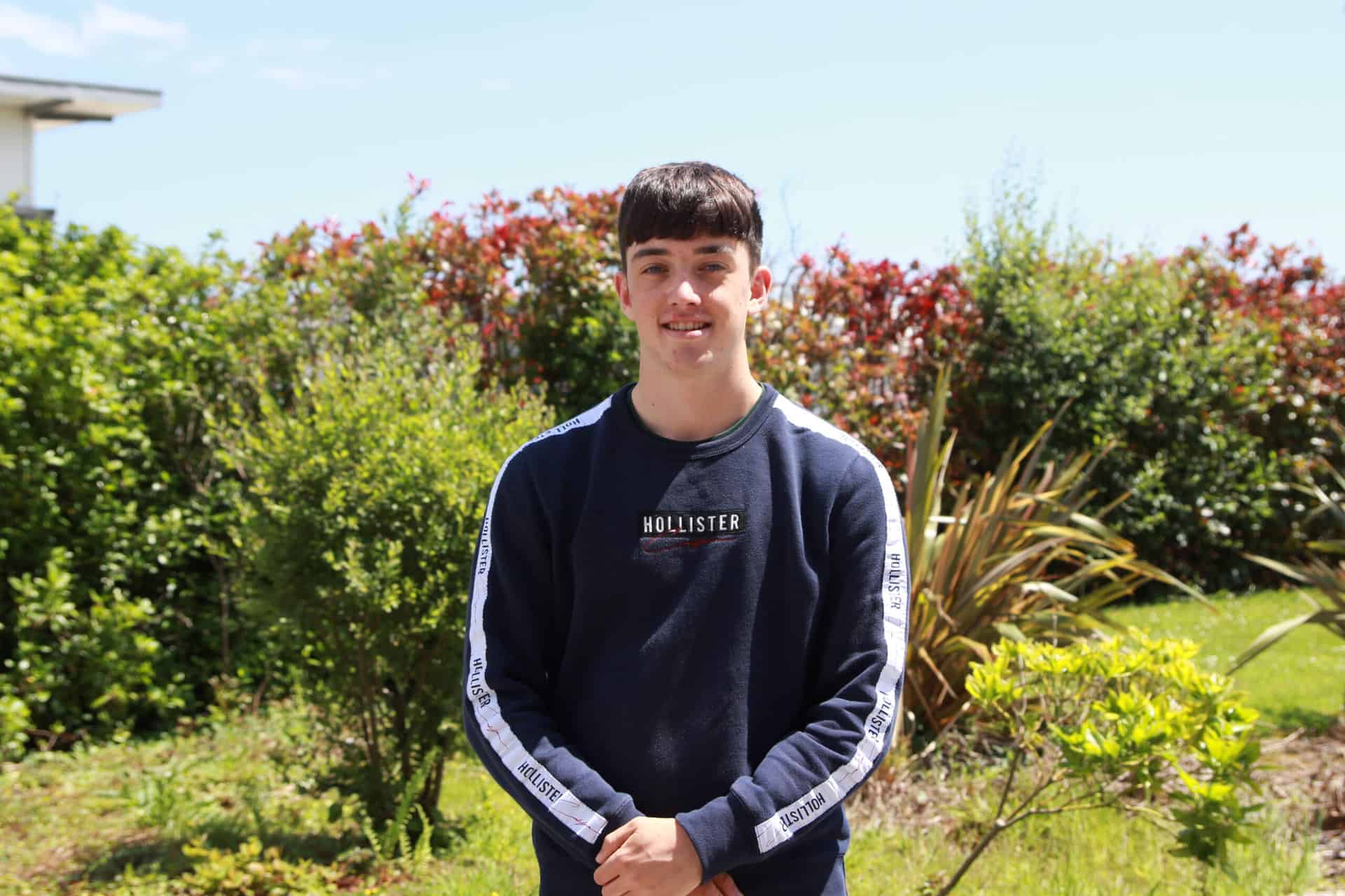 Matt stood outside at the College