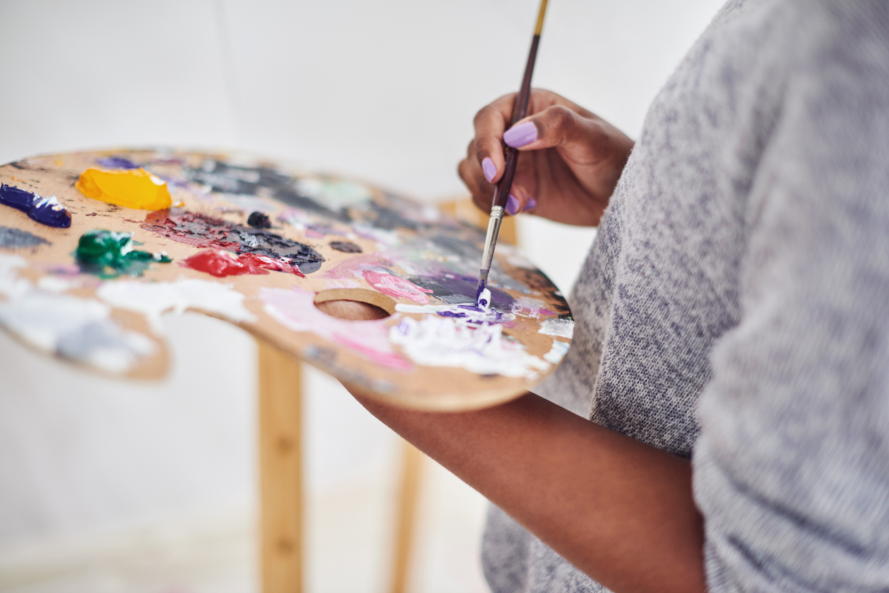 Cropped shot of an unrecognizable woman holding a painter's palette