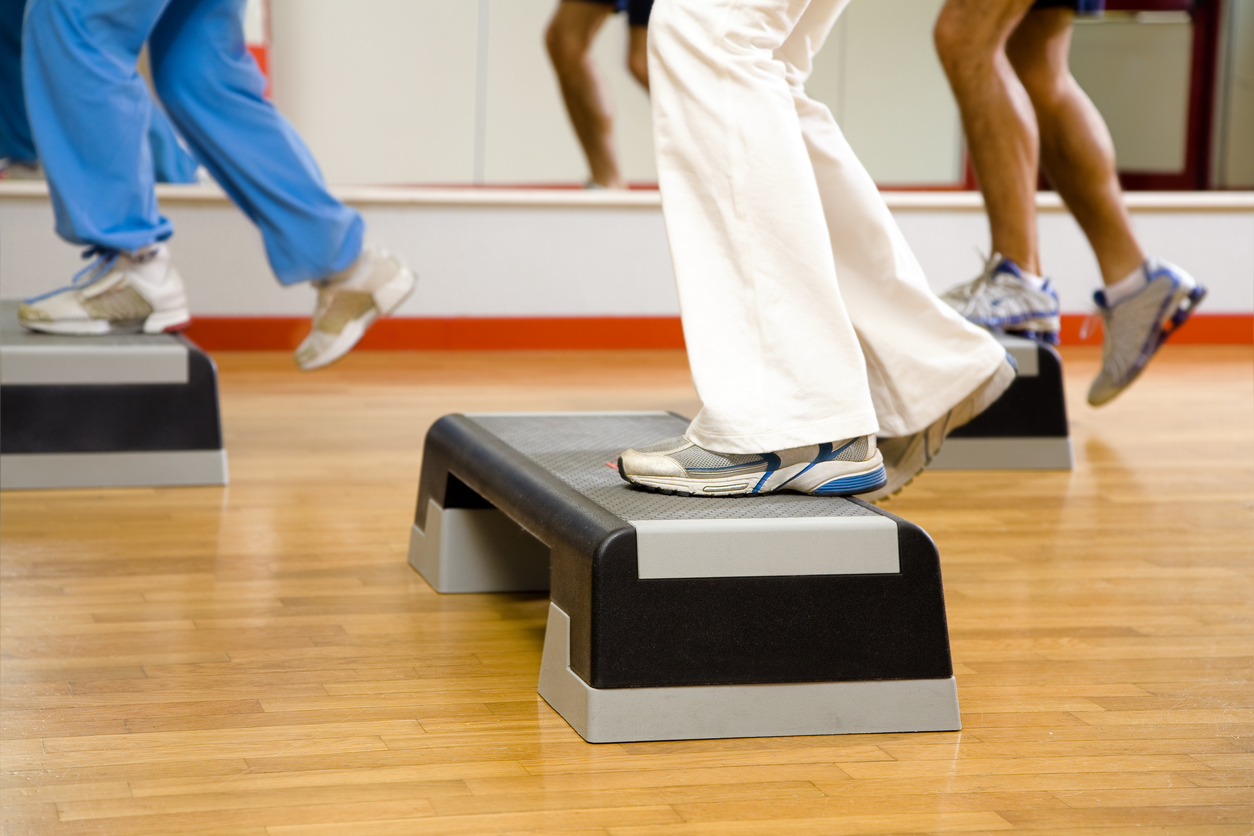 health club: group of people doing aerobics
