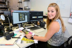 A female marketing professional at her desk