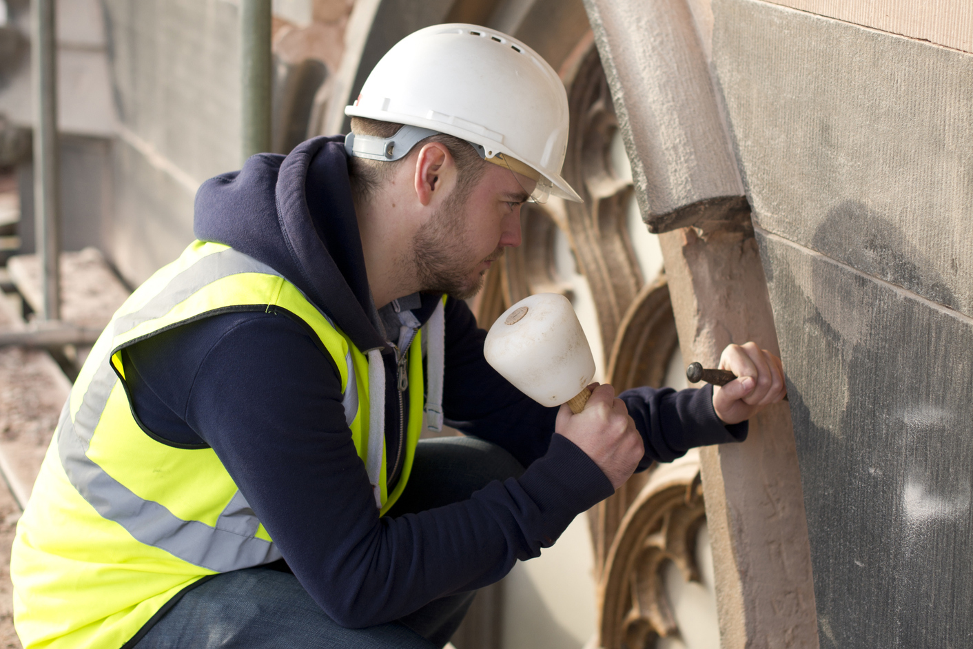 stonemason on a church restoration