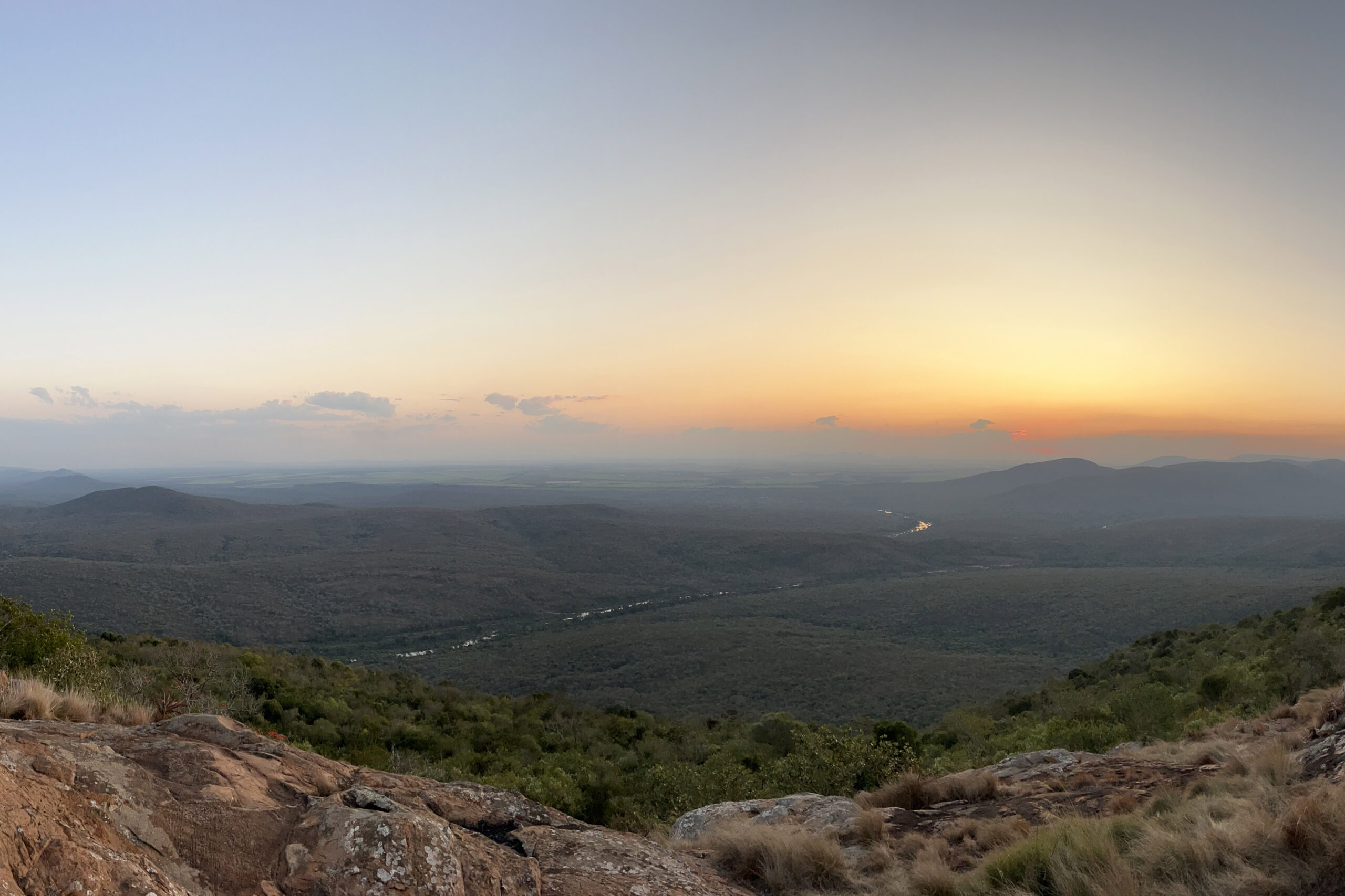 Eswatini 0002 A beautiful sunset over vast mountains. The Shewula Mountain camp view.