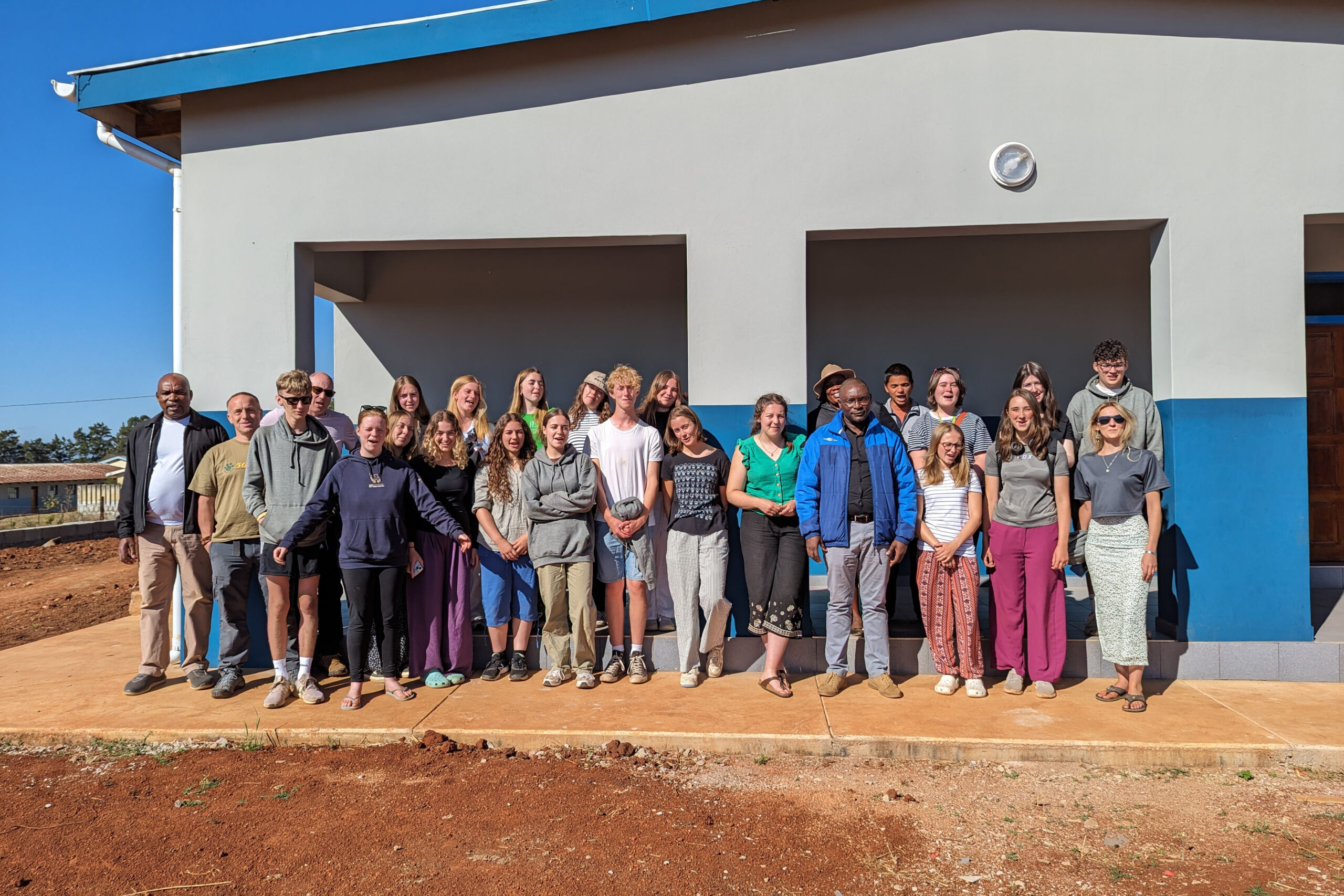 A group photo of students outside the Shewula high school.