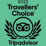 An award logo. The text reads '2022 Travellers' Choice Tripadvisor' and has the tripadvisor logo in the centre.