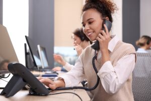 Call center operators working in modern office.
