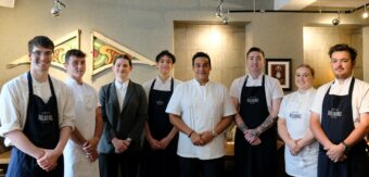 Paul Ainsworth standing with his Apprentices in Cafe Rojano