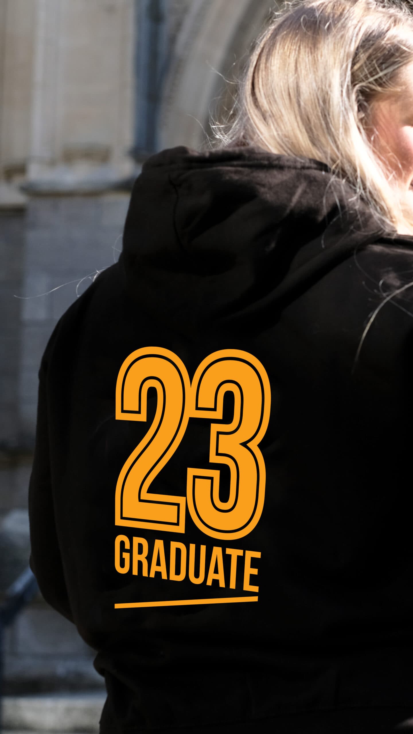 Graduate Hoodie University Centre Truro & Penwith. An image of a student wearing the graduate hoodie.