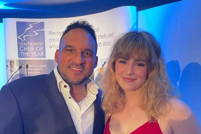 Lottie collecting award from host Michael Caines.