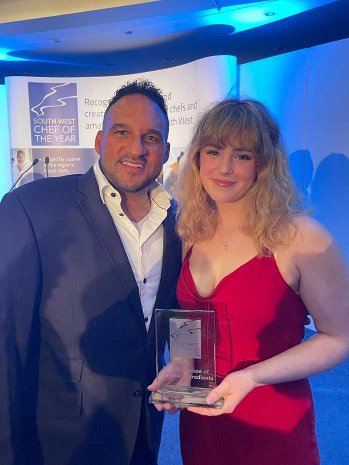 Lottie collecting award from host Michael Caines.