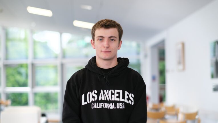 Young male student in black hoodie at Penwith College