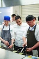 Paul Ainsworth teaching professional cookery students at college.