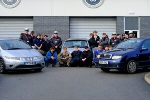 Police donate cars to the college Automotive department.