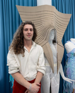 Art student infront of their art work
