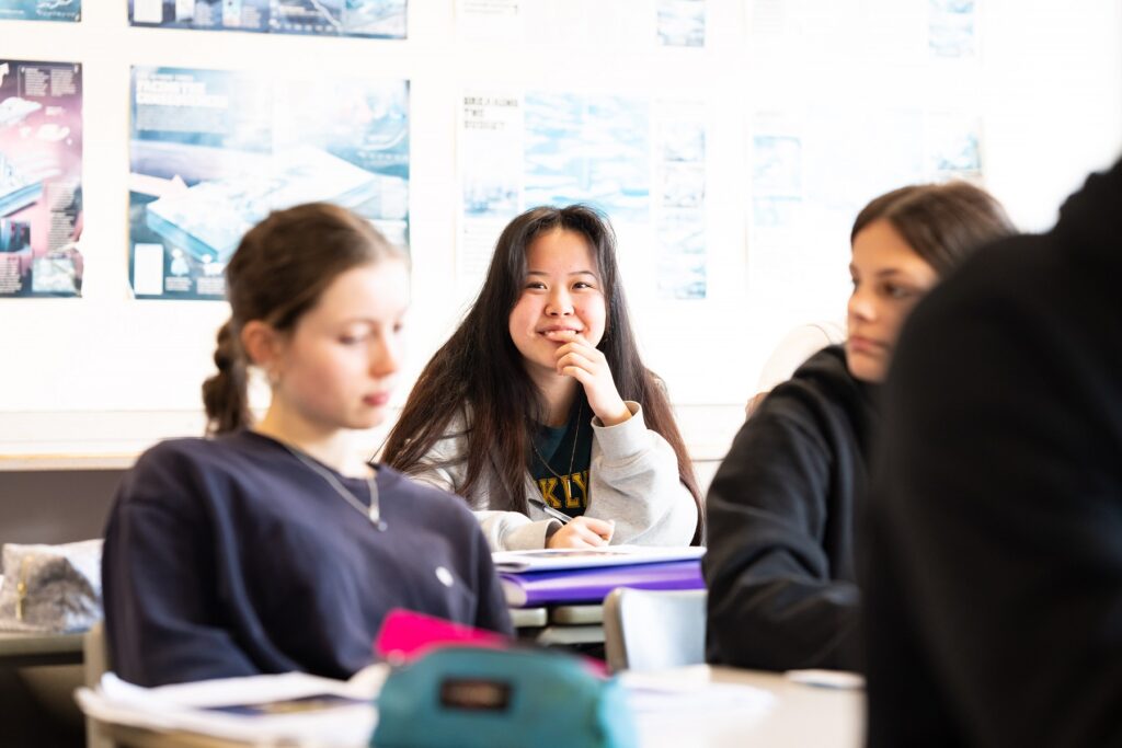 Students sat at class.