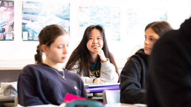 Students sat at class.
