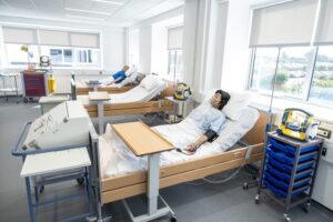 The health simulation suite which has dummys lying in beds with breathing apparatus attached to them.