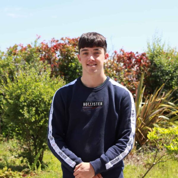Matt stood outside on a sunny day.
