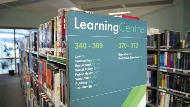A bookcase in a learning centre at the College.