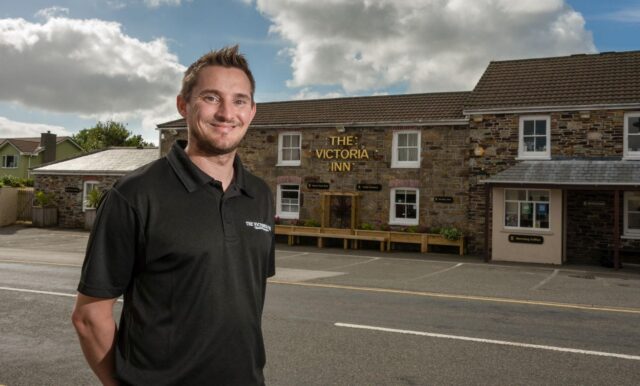 Mark Holden stood outside the Victoria Inn in Truro.