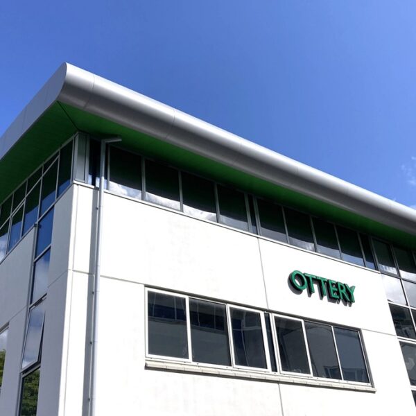 An image of a corner of the STEM and Health Skills Centre in Bodmin, Cornwall with blue sky and white clouds.