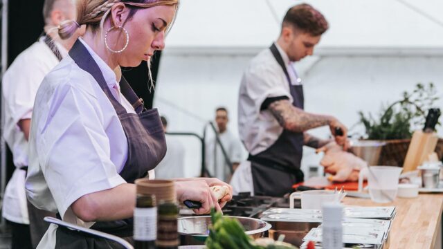 Chefs doing a cooking demonstration.