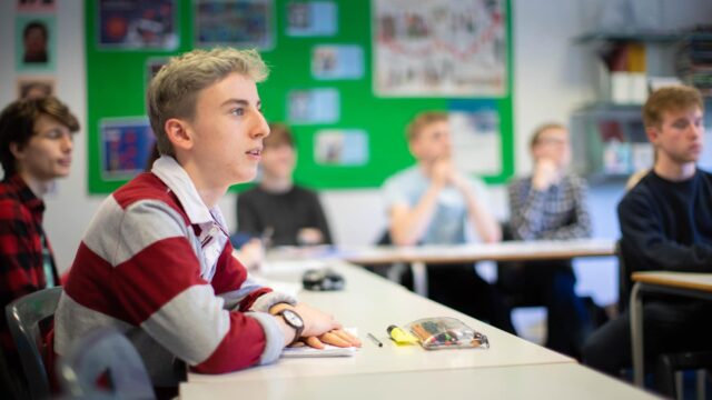Students sat in a class at Truro College.