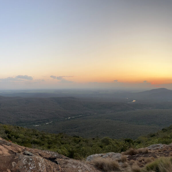 A beautiful sunset over vast mountains. The Shewula Mountain camp view.