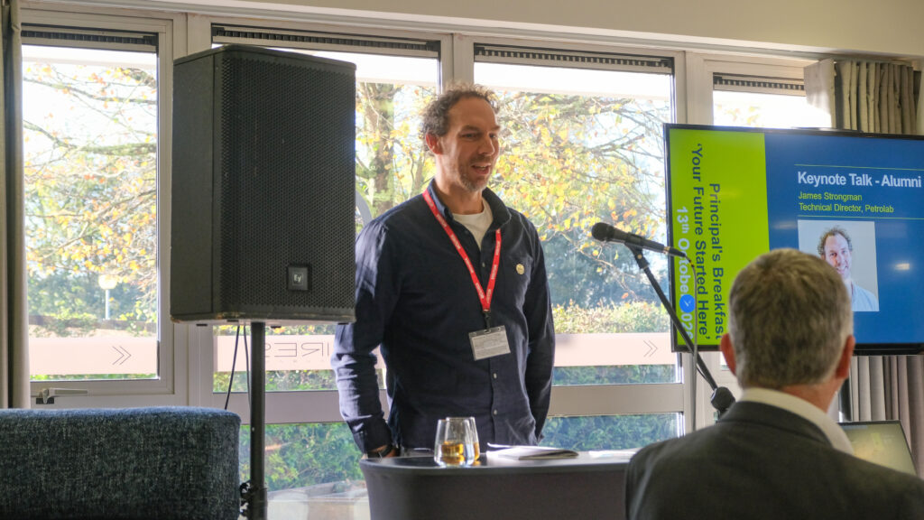 James Strongman, Director at Petrolab pictured, stood whilst delivering a speech